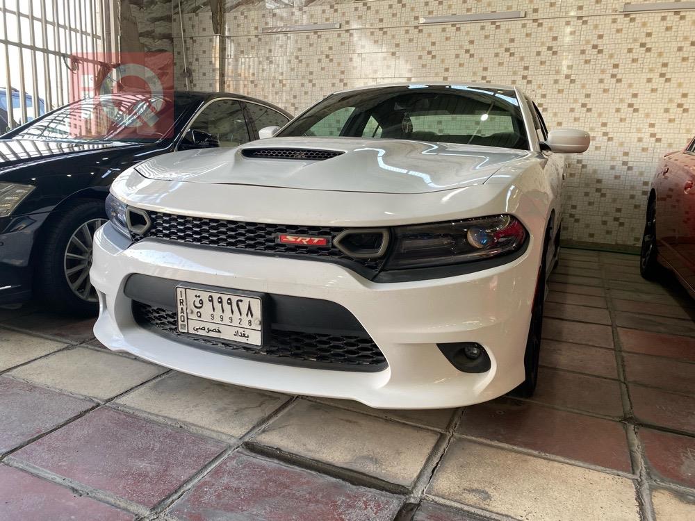 دۆج چارجەر